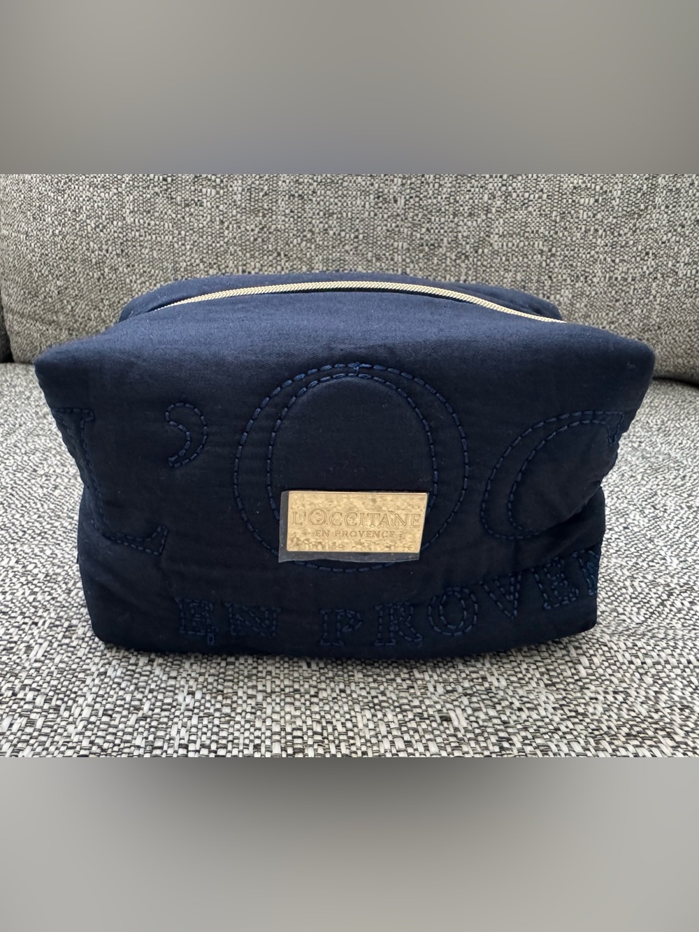 L'OCCITANE Navy Quilted Cosmetic Clutch with Gold Plaque
